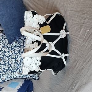 Furla black canvas and white leather handbag.